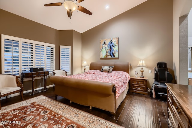 12754 E Laurel Ln, Scottsdale, AZ 85259 - bedroom with dark wood-style floors, baseboards, vaulted ceiling, and ceiling fan