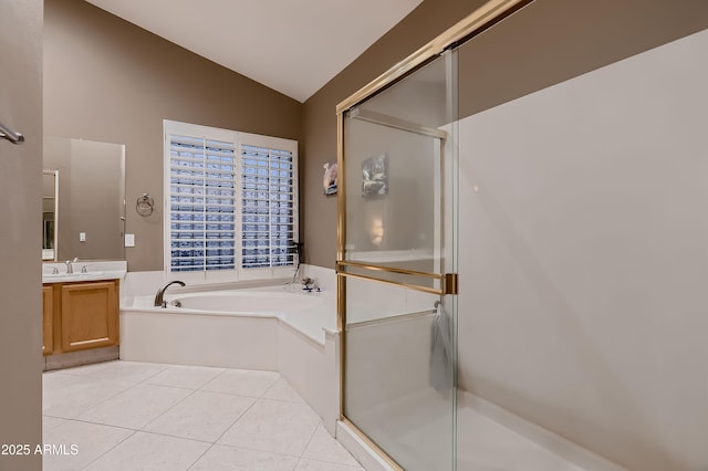 12754 E Laurel Ln, Scottsdale, AZ 85259 - full bathroom with vaulted ceiling, a garden tub, vanity, a stall shower, and tile patterned flooring