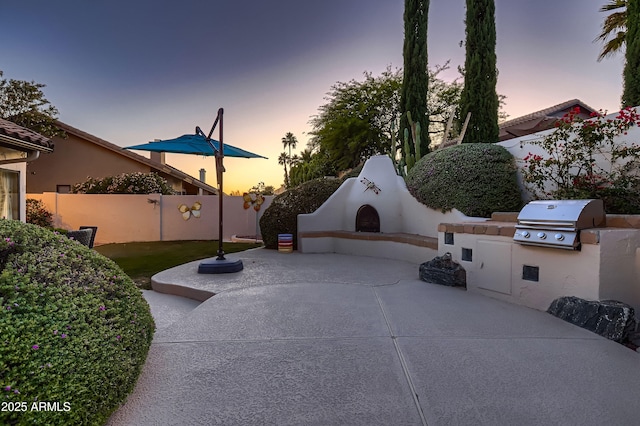 12754 E Laurel Ln, Scottsdale, AZ 85259 - view of patio / terrace with exterior fireplace