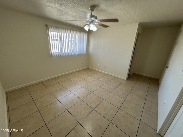 3814 N 55th Dr, Phoenix, AZ 85031 - spare room with light tile patterned floors, ceiling fan, and a textured ceiling