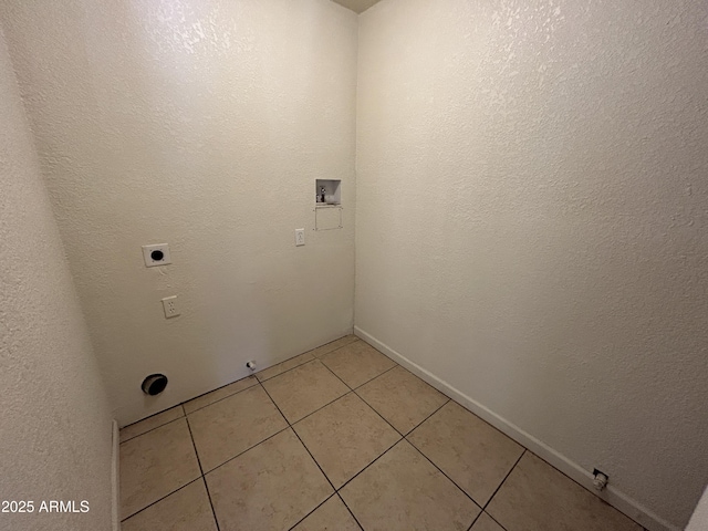 3814 N 55th Dr, Phoenix, AZ 85031 - laundry room featuring electric dryer hookup, washer hookup, light tile patterned flooring, hookup for a gas dryer, and baseboards