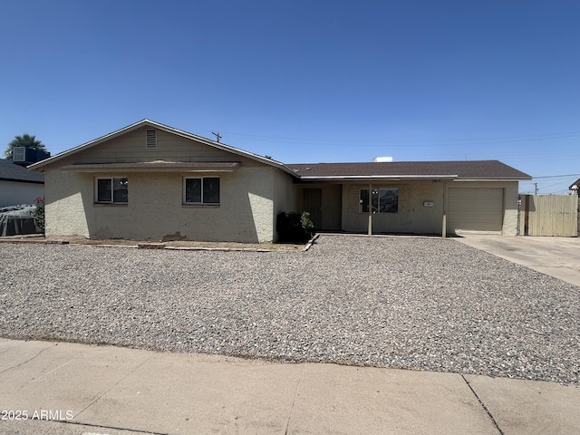 3814 N 55th Dr, Phoenix, AZ 85031 - single story home featuring an attached garage, driveway, and stucco siding