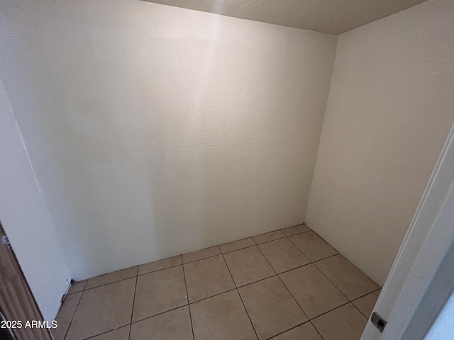 3814 N 55th Dr, Phoenix, AZ 85031 - spare room featuring light tile patterned floors