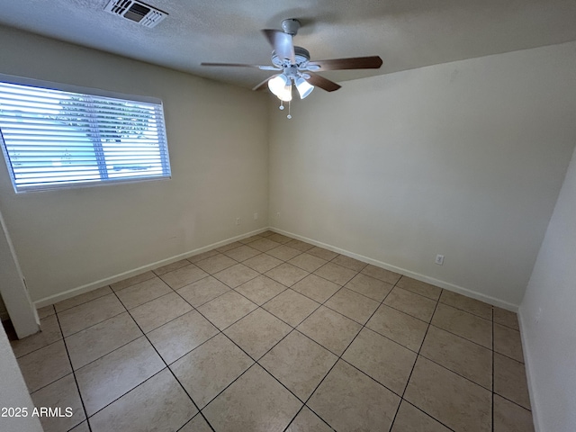 3814 N 55th Dr, Phoenix, AZ 85031 - unfurnished room with ceiling fan, light tile patterned floors, and baseboards