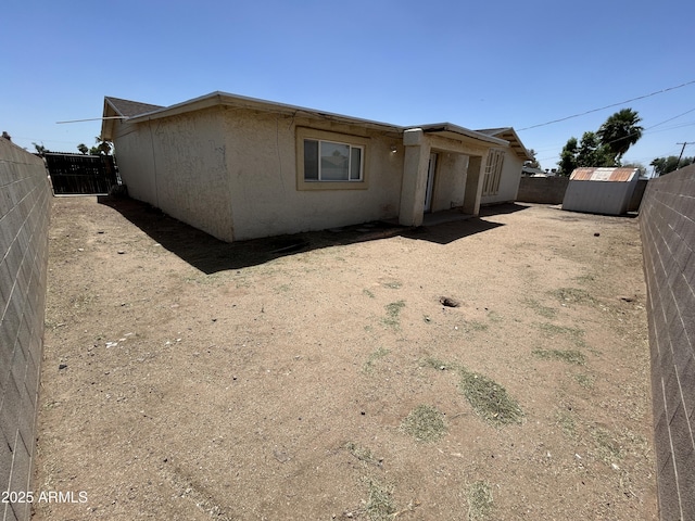 3814 N 55th Dr, Phoenix, AZ 85031 - rear view of house featuring a fenced backyard