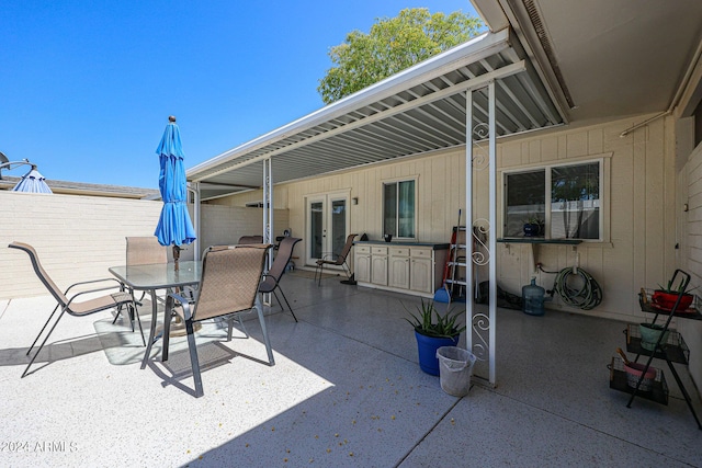 view of patio featuring french doors