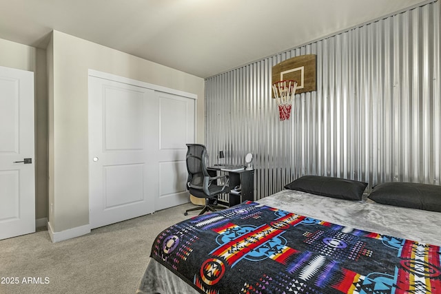 carpeted bedroom with a closet