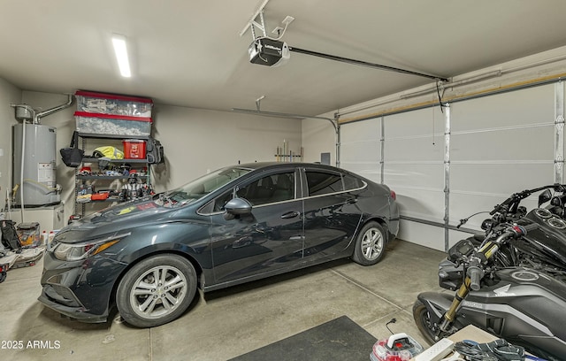 garage featuring a garage door opener and gas water heater