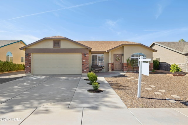 ranch-style house featuring a garage