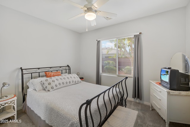 bedroom with light carpet, visible vents, baseboards, and ceiling fan