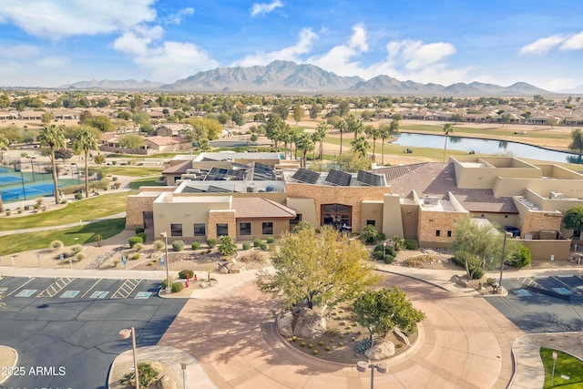 aerial view with a residential view and a water and mountain view