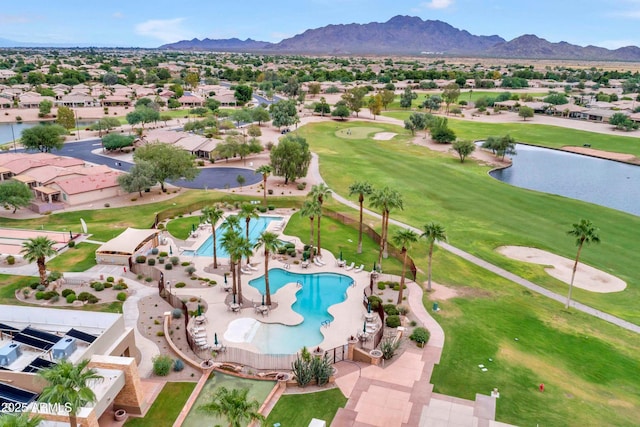 aerial view with a residential view, golf course view, and a water and mountain view