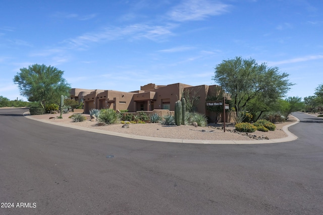 view of pueblo revival-style home