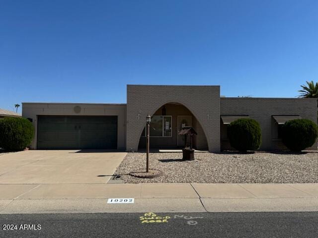 view of front of property featuring a garage