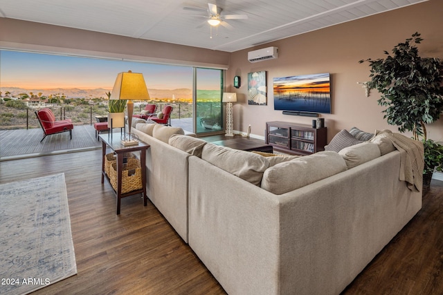 living room featuring a wall mounted air conditioner, dark hardwood / wood-style floors, and ceiling fan