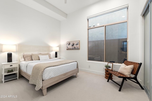 bedroom featuring ceiling fan and light colored carpet