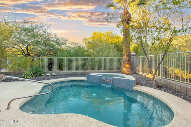 pool at dusk featuring pool water feature, central air condition unit, and an in ground hot tub