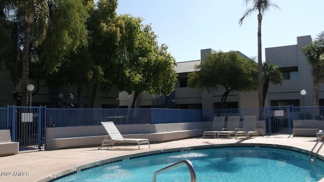 3301 E Earll Dr Unit 219, Phoenix, AZ 85018 - community pool with a patio area