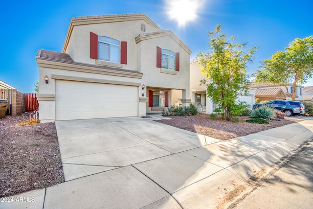 view of front property with a garage