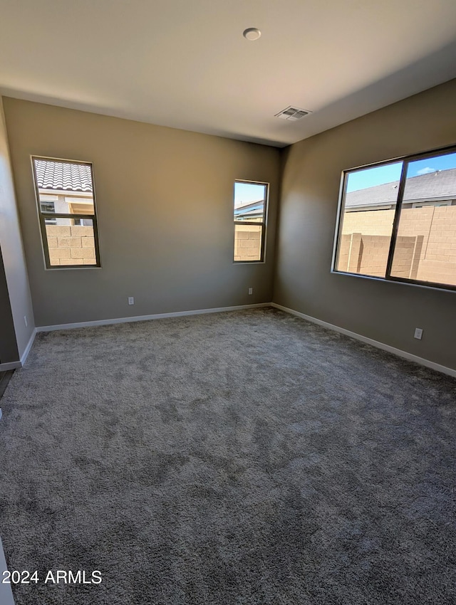 view of carpeted spare room