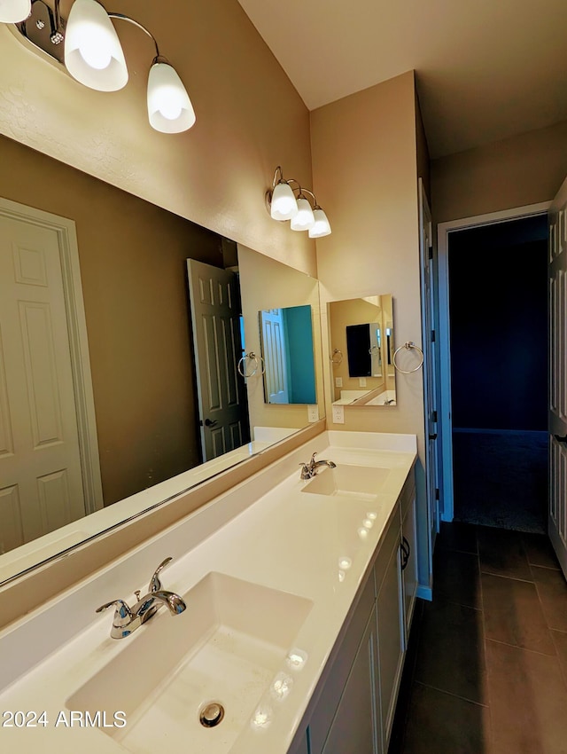 bathroom with vanity and tile patterned flooring