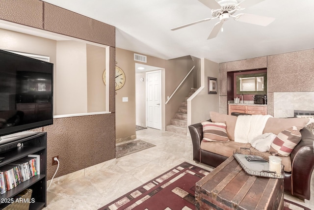 living room featuring ceiling fan