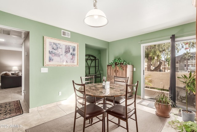 view of tiled dining area