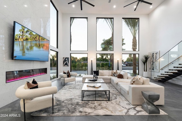 living room featuring a high ceiling