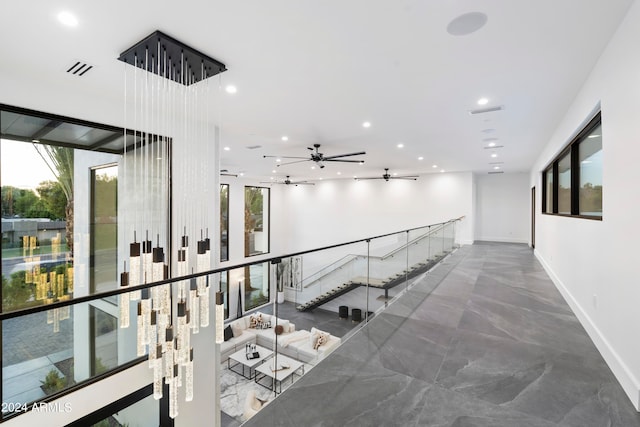 hallway featuring plenty of natural light