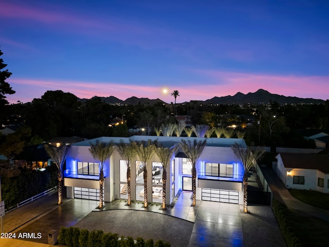 view of front of property with a mountain view