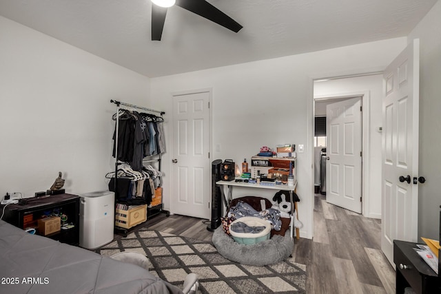 11132 W Indiana Ave, Youngtown, AZ 85363 - bedroom with wood finished floors and a ceiling fan