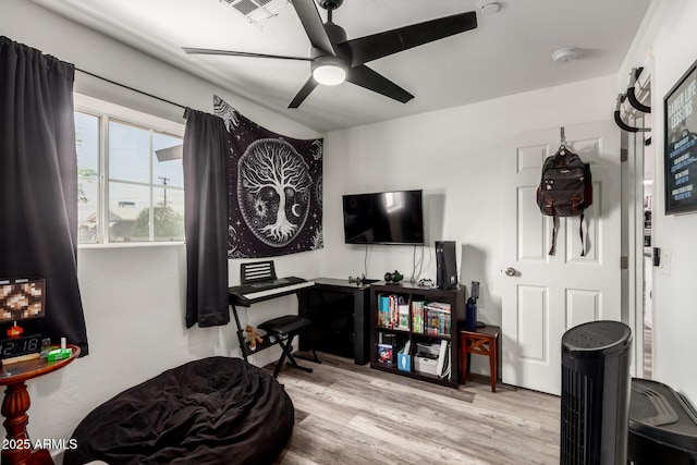 11132 W Indiana Ave, Youngtown, AZ 85363 - sitting room featuring wood finished floors and a ceiling fan