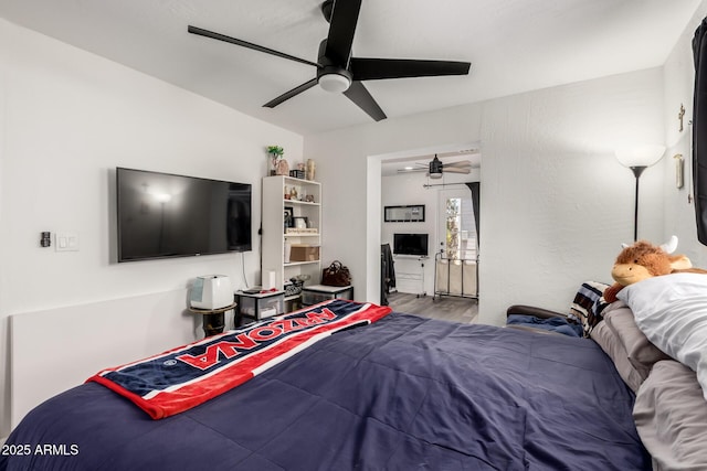 11132 W Indiana Ave, Youngtown, AZ 85363 - bedroom with wood finished floors and ceiling fan
