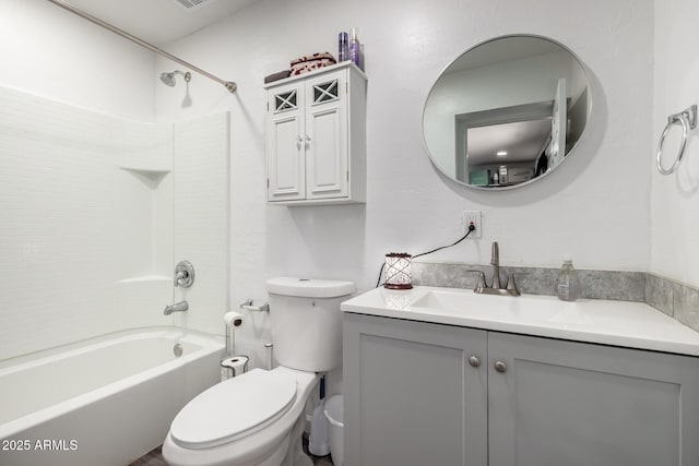 11132 W Indiana Ave, Youngtown, AZ 85363 - bathroom with toilet, vanity, and bathtub / shower combination