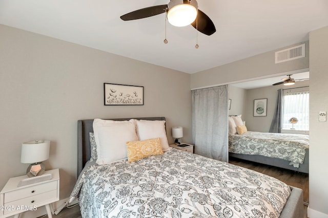 bedroom featuring ceiling fan and wood-type flooring