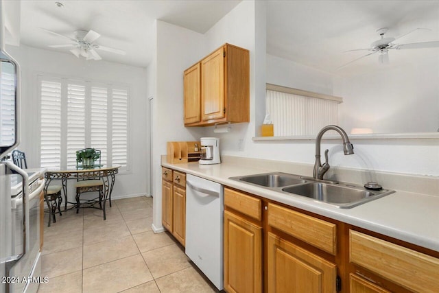 kitchen featuring dishwasher, light tile patterned floors, ceiling fan, and sink