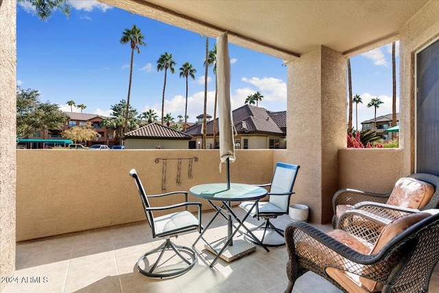 view of patio with a balcony