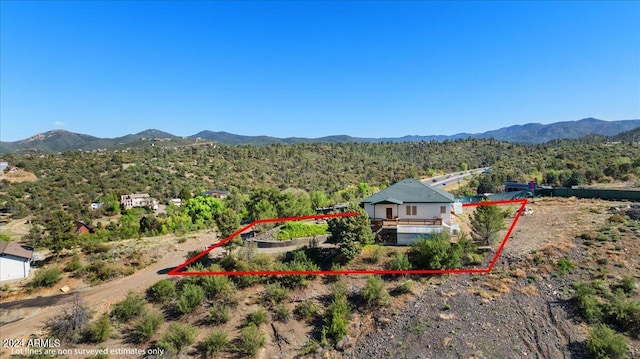 drone / aerial view featuring a mountain view