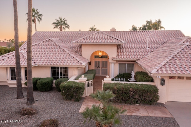 view of front of house with a garage