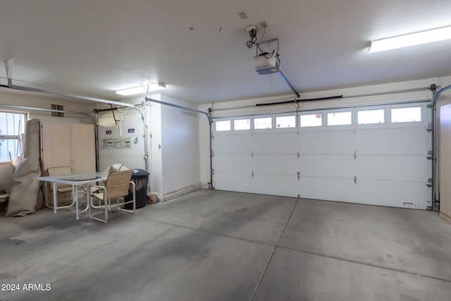 garage featuring a garage door opener