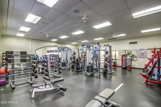 workout area featuring a drop ceiling