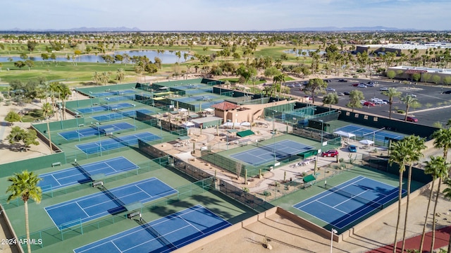 birds eye view of property with a water view