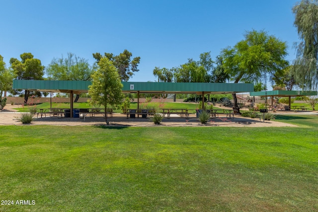 view of home's community featuring a lawn