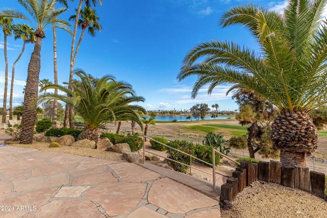 view of patio featuring a water view