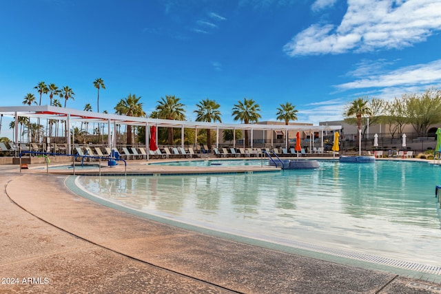 view of swimming pool featuring a patio