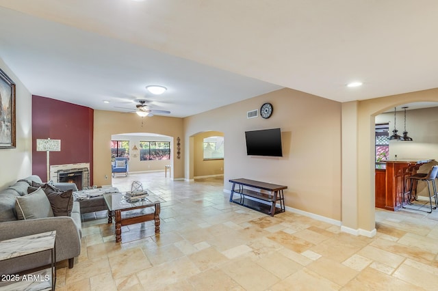 living room featuring ceiling fan