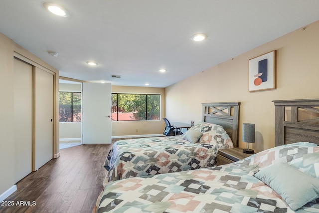 bedroom featuring wood-type flooring