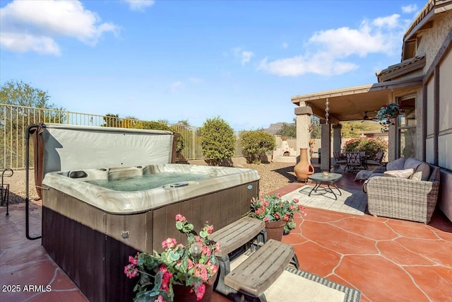 view of patio with a hot tub