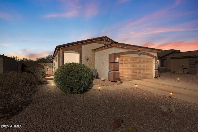 view of front of home with a garage