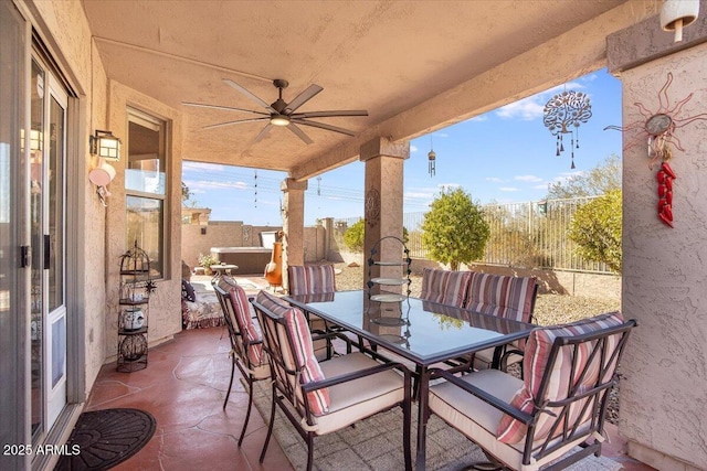 view of patio with ceiling fan